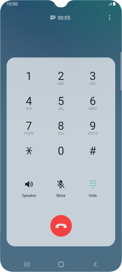 Press the end call icon.