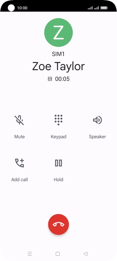 Press the end call icon.