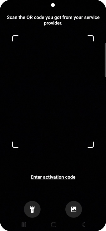 Place the QR code you've received inside the phone camera frame to scan the code. Your eSIM is transferred to your new phone over the internet.