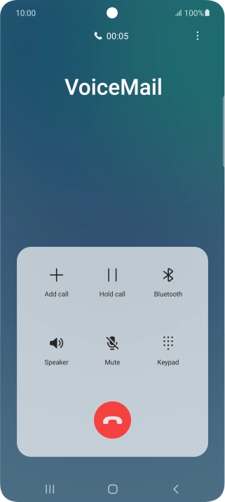 Press the end call icon.