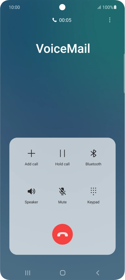 Press the end call icon.