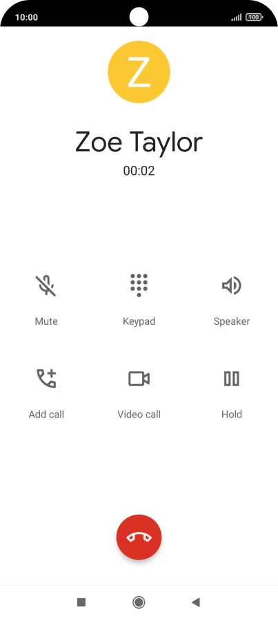 Press the end call icon.