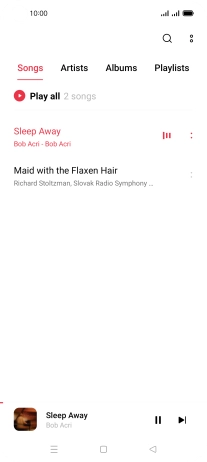 Press the song title at the bottom of the screen.