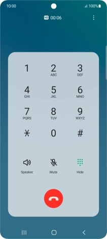 Press the end call icon.