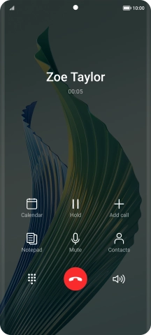 Press the end call icon.