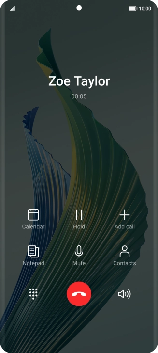 Press the end call icon.