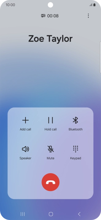 Press the end call icon.