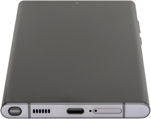 Insert the opener into the small hole in the SIM holder.