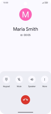 Press the end call icon.