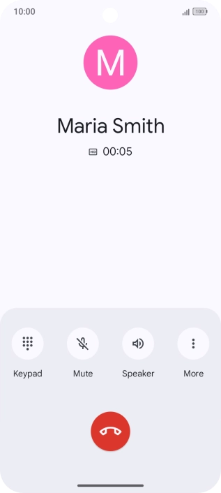 Press the end call icon.