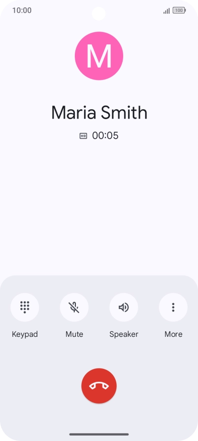 Press the end call icon.