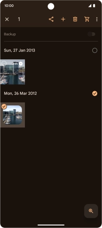 Press the required pictures or videos to select them.