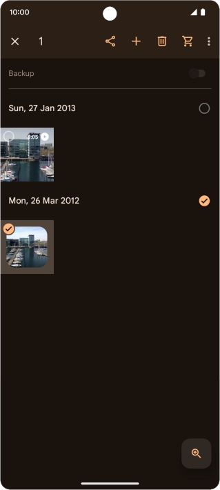 Press the required pictures or videos to select them.