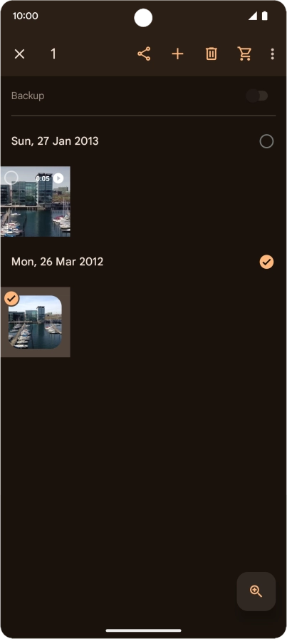Press the required pictures or videos to select them.