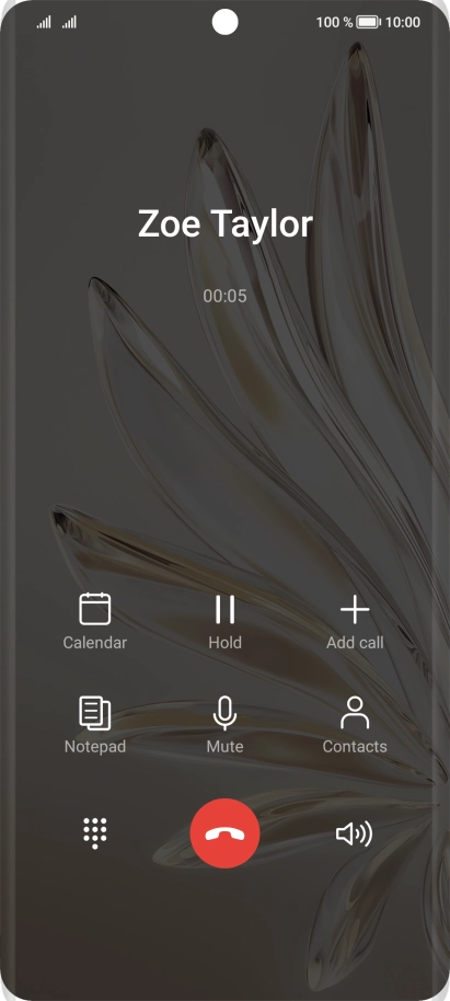 Press the end call icon.