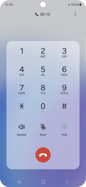 Press the end call icon.