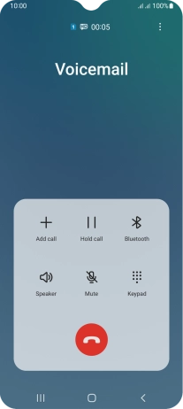 Press the end call icon.