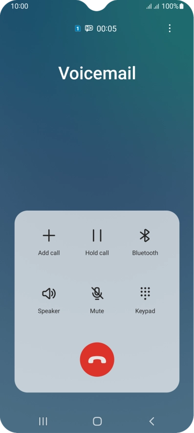 Press the end call icon.