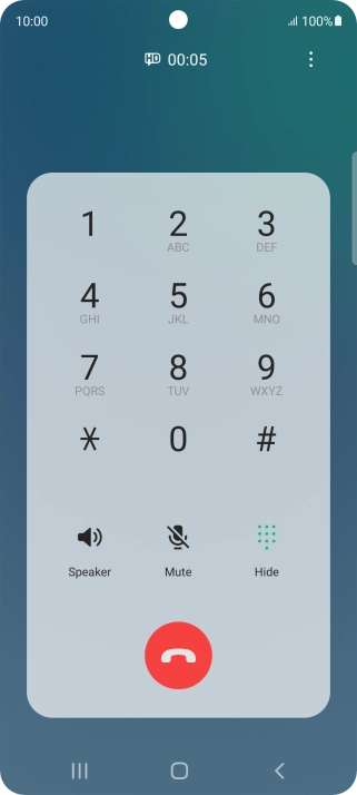 Press the end call icon.