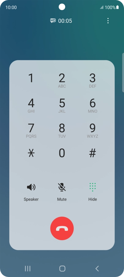 Press the end call icon.