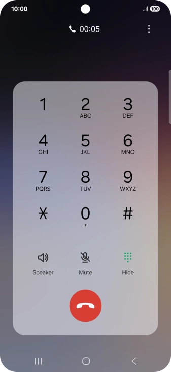 Press the end call icon.