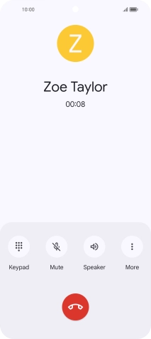 Press the end call icon.