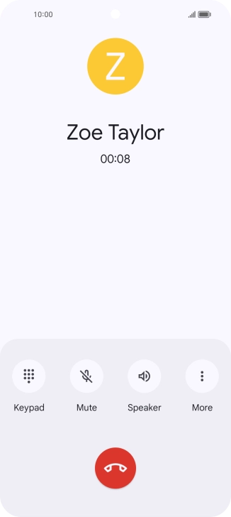 Press the end call icon.