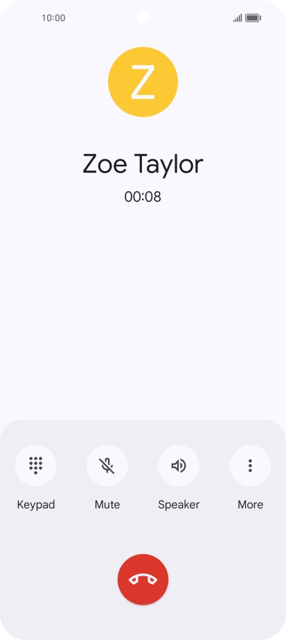 Press the end call icon.