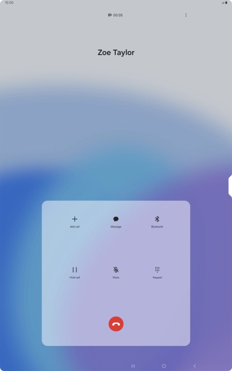 Press the end call icon.