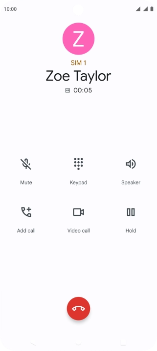 Press the end call icon.