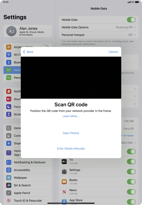 Place the QR code you've received inside the tablet camera frame to scan the code. Your eSIM is transferred to your new tablet over the internet.