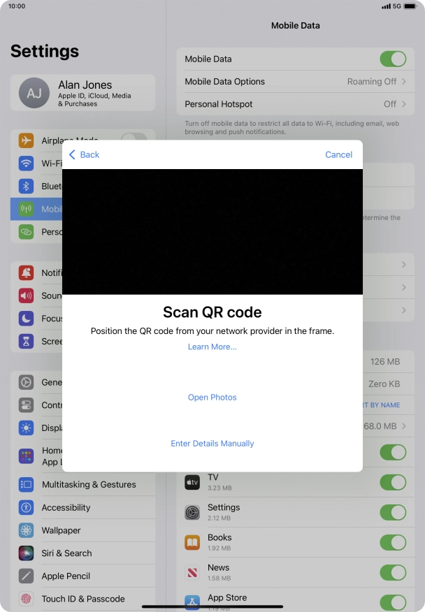 Place the QR code you've received inside the tablet camera frame to scan the code. Your eSIM is transferred to your new tablet over the internet.