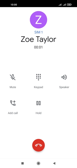 Press the end call icon.