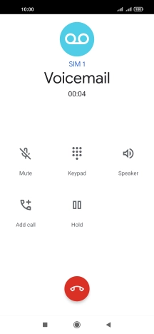 Press the end call icon.