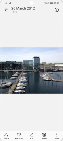 Slide your finger upwards starting from the bottom of the screen to return to the home screen.