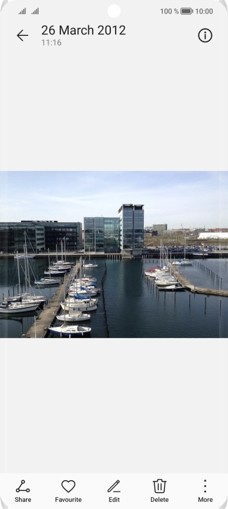 Slide your finger upwards starting from the bottom of the screen to return to the home screen.