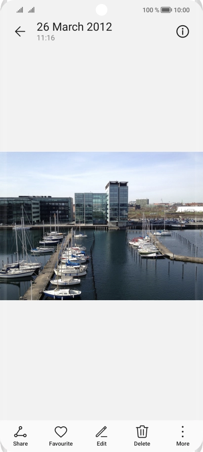 Slide your finger upwards starting from the bottom of the screen to return to the home screen.