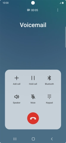 Press the end call icon.