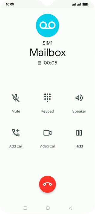 Press the end call icon.