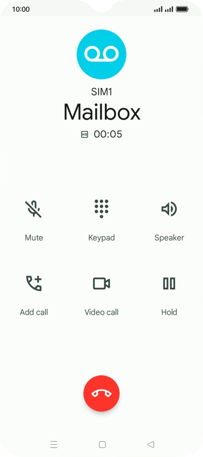 Press the end call icon.