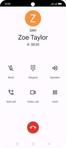 Press the end call icon.