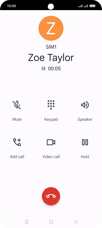 Press the end call icon.