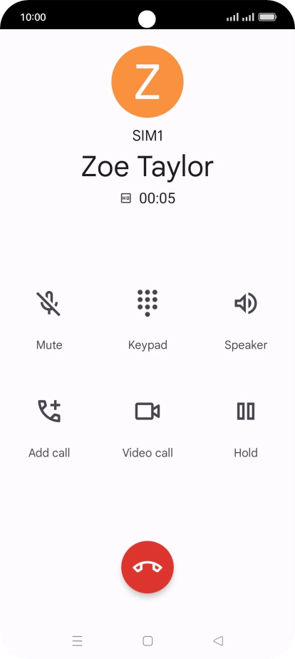 Press the end call icon.