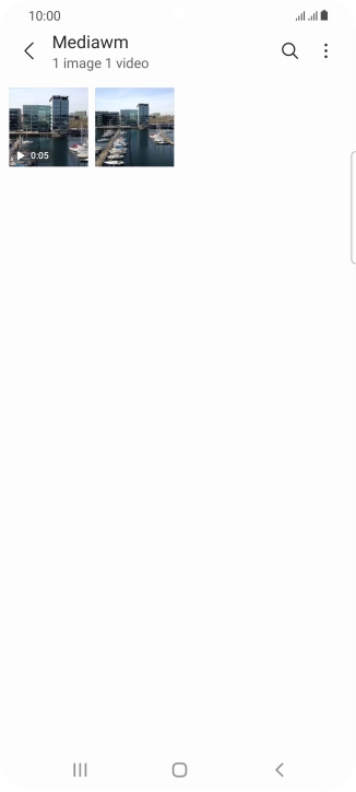 Press and hold the required picture or video clip. Press and hold the required picture or video clip.