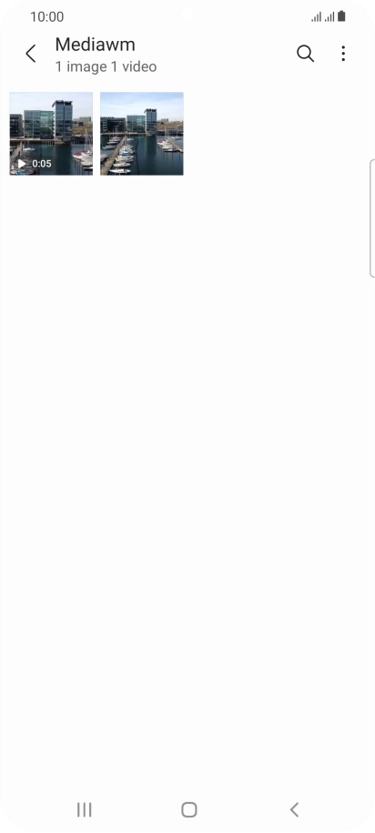 Press and hold the required picture or video clip. Press and hold the required picture or video clip.