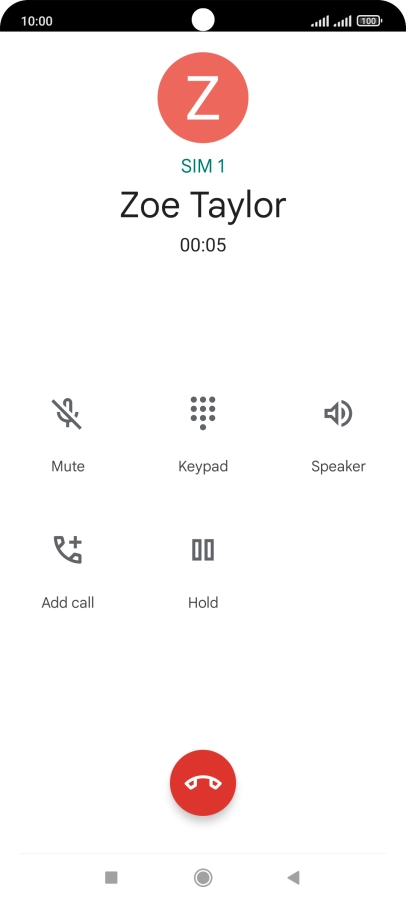Press the end call icon.