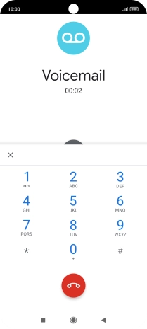 Press the end call icon.