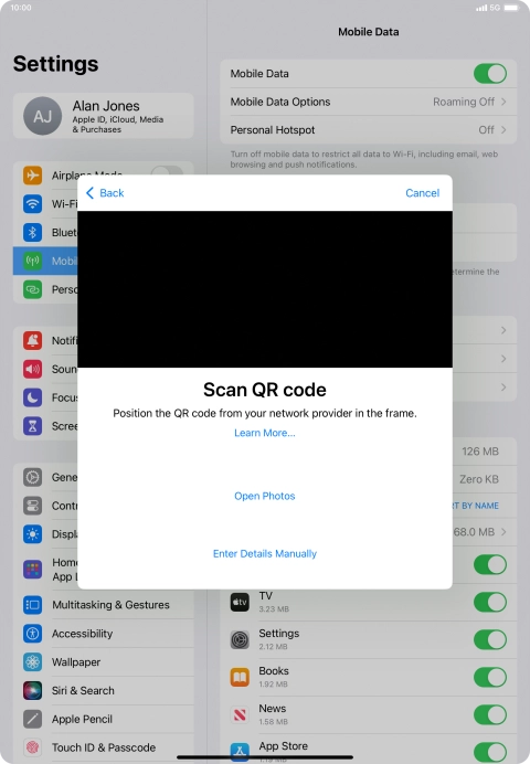 Place the QR code you've received inside the tablet camera frame to scan the code. Your eSIM is transferred to your new tablet over the internet.