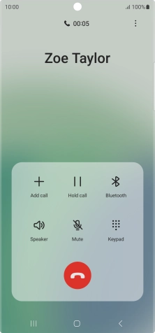 Press the end call icon.