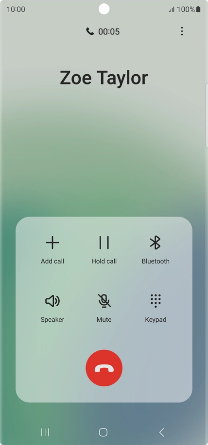Press the end call icon.